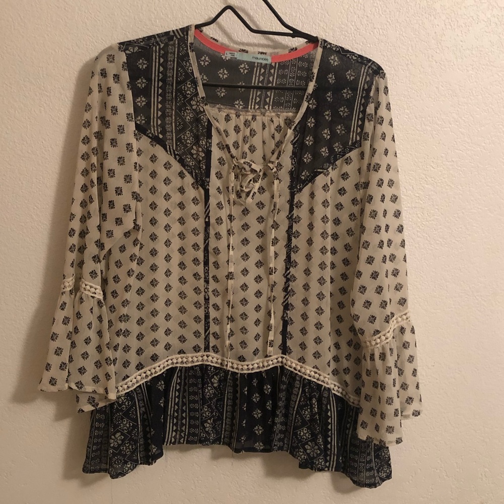 This is a adorable boho style blouse from Maurice’s.